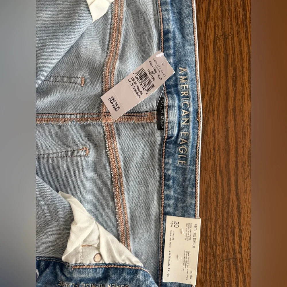 American Eagle Outfitters Light Blue Distressed Flare Jeans - Picture 3 of 8